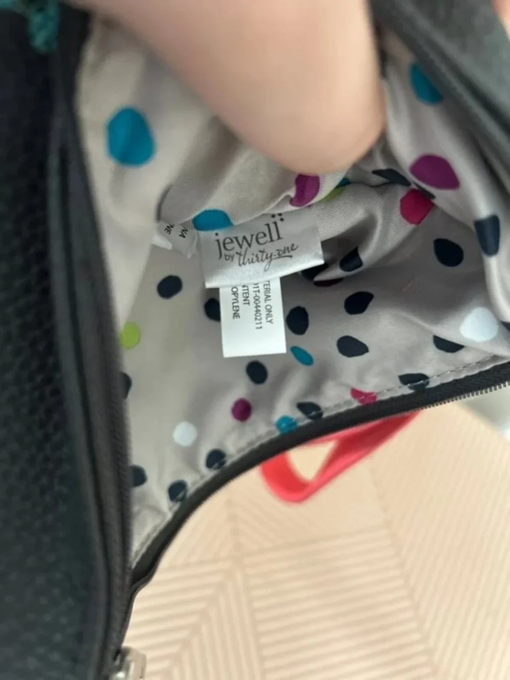 Thirty-one Wristlet bag embroidered with a floral “C”